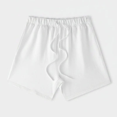 White athletic shorts with an elastic waistband and a matching white drawstring, shown flat on a light gray background.